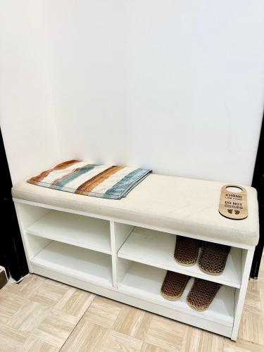 a white bunk bed in a room at Nemaru urban stay in Ho Chi Minh City