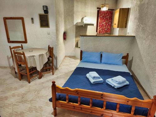 Кровать или кровати в номере Akrata Golden Beach House 3