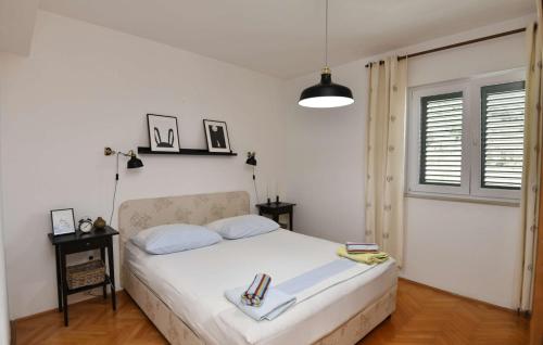 Postel nebo postele na pokoji v ubytování Apartman Marina - Makarska by Villas Guide