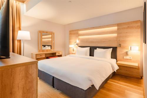 Radisson Blu Hotel & Residencesにあるベッド
