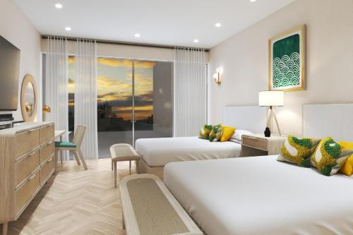 Postel nebo postele na pokoji v ubytování Sapphire Sands by Bay Gardens Resorts