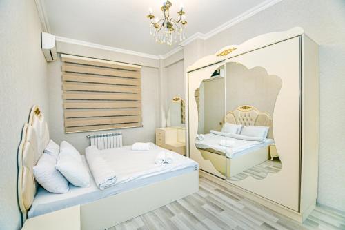 Llit o llits en una habitació de PARK Apartment