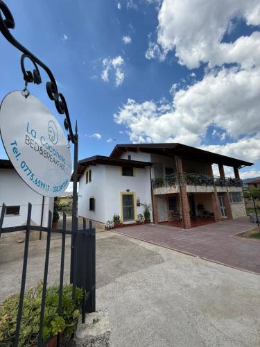 a building with a sign in front of it at B&B La Coccinella in Amaseno