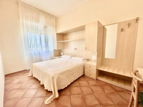 Hotel Di Roccoにあるベッド
