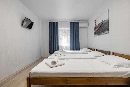 Ένα ή περισσότερα κρεβάτια σε δωμάτιο στο River House