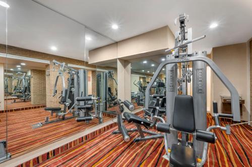 a gym with treadmills and cardio equipment in a building at Best Western Manassas in Manassas