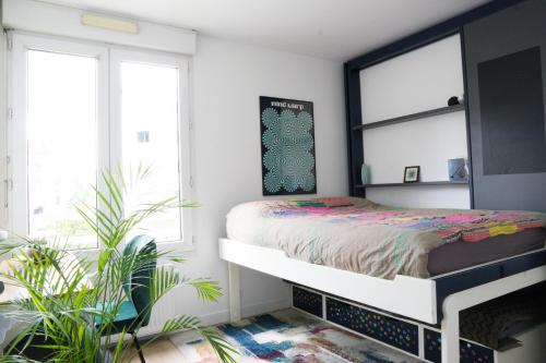 Postel nebo postele na pokoji v ubytování EXIGEHOME-Luxury apartment 10 minutes from Paris