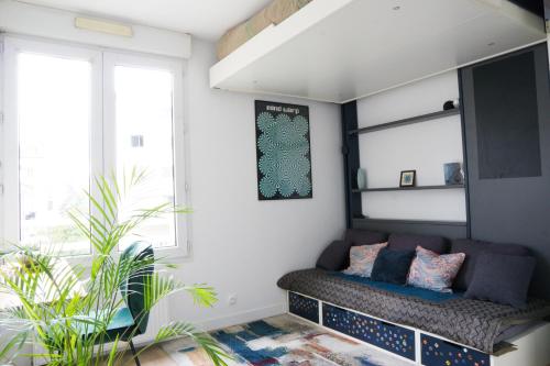 Posezení v ubytování EXIGEHOME-Luxury apartment 10 minutes from Paris