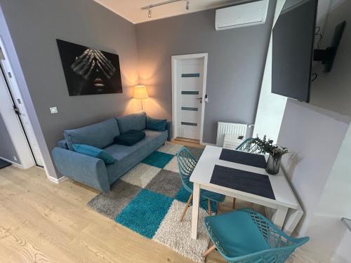 TV a/nebo společenská místnost v ubytování Apartment Targowa L5