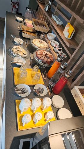 a buffet with many different types of food on a table at Agritur Gasadòr in Trento