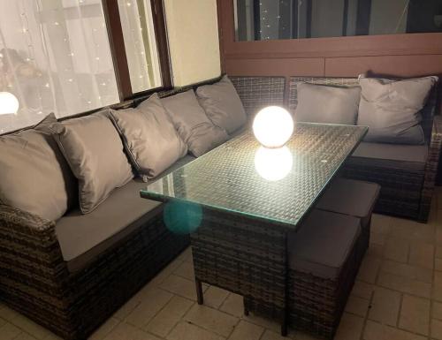 a living room with a couch and a table at Urlaub in Enzklößterle in Enzklösterle