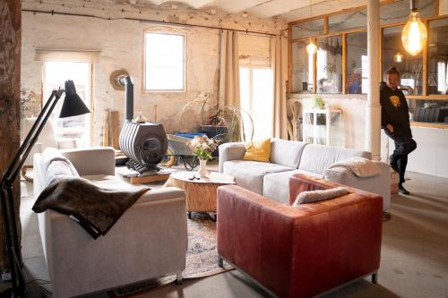 Χώρος καθιστικού στο FarmhouseLoft mit Whirlpool & Kamin