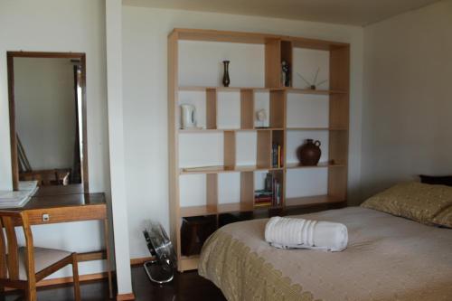 Postel nebo postele na pokoji v ubytování Loma de las Maravillas