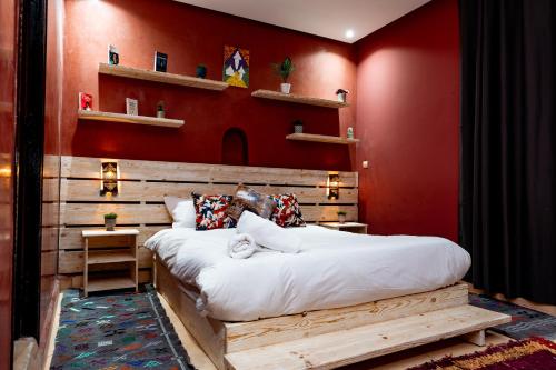 En eller flere senge i et værelse på Villa Nour Mogador