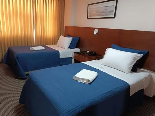 Katil atau katil-katil dalam bilik di El Puerto Hotel