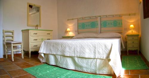 Ένα ή περισσότερα κρεβάτια σε δωμάτιο στο Agriturismo Fioredda