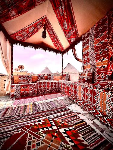 a room with colorful mosaics on the floor at Are Pyramids View in Cairo