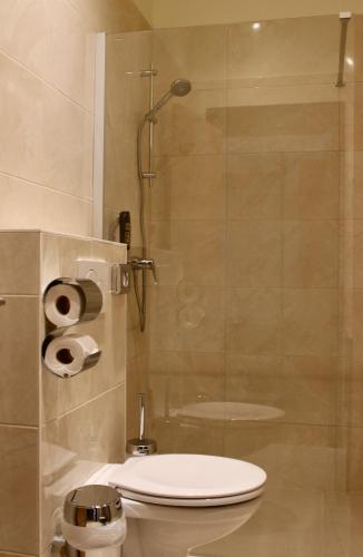 Un baño de City Inn 24H Self Check-In by H&H Hotels