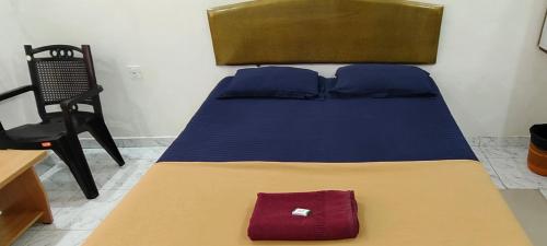 Hotel SAVI SAGARにあるベッド