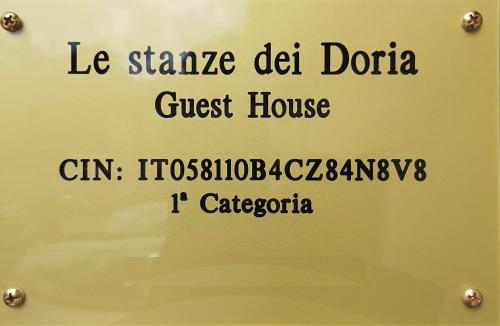 a sign for a guest house in a restaurant at Le Stanze dei Doria in Valmontone