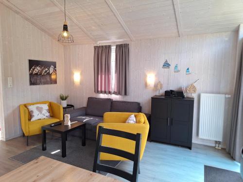 O zonă de relaxare la Strandhaus Dünenpark 2a