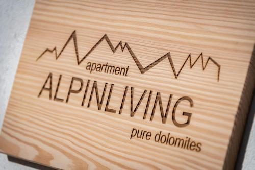 a sign with the wordsartneyartneyartneyartneyartney at pumping at Apartment Mittermanting Villnöss in Villnoss