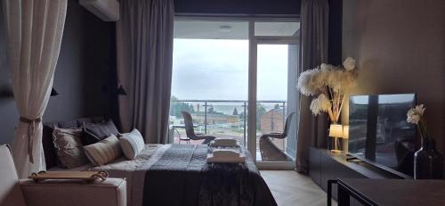 Χώρος καθιστικού στο Apartament Giżycko Studio 57 , kawalerka z widokiem na jezioro