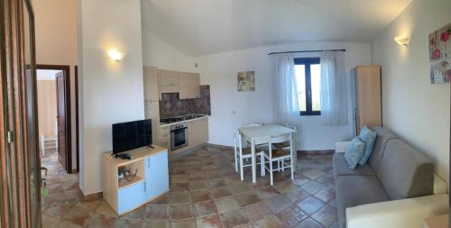 Kuchyň nebo kuchyňský kout v ubytování Appartamento SAN TEODORO CENTRO