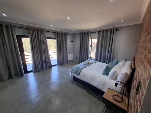 Ένα ή περισσότερα κρεβάτια σε δωμάτιο στο The Goose Guesthouse