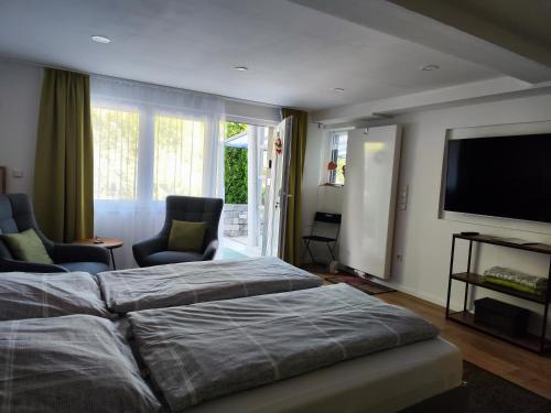 Katil atau katil-katil dalam bilik di Kleines Moselchalet