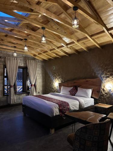 a bedroom with a large bed in a room at Trivor Resort Hunza in Hunza