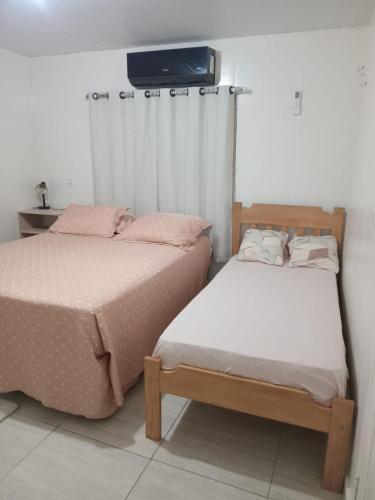 Postel nebo postele na pokoji v ubytování Apartamento Mobiliado