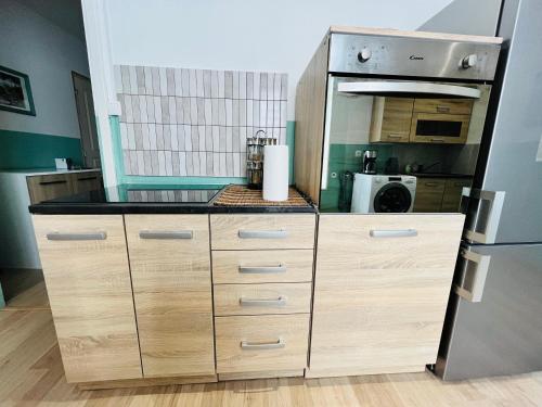 Una cocina o cocineta en L'Athéna