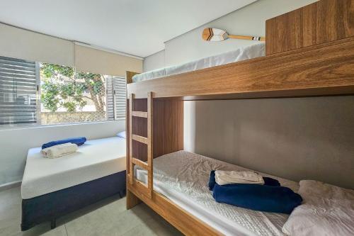 Postel nebo postele na pokoji v ubytování F1-Pe na Areia da Praia do Tombo, 2 Suites, Ar Cond, 2 Banheiros, 1 Vaga + Roupas de Cama