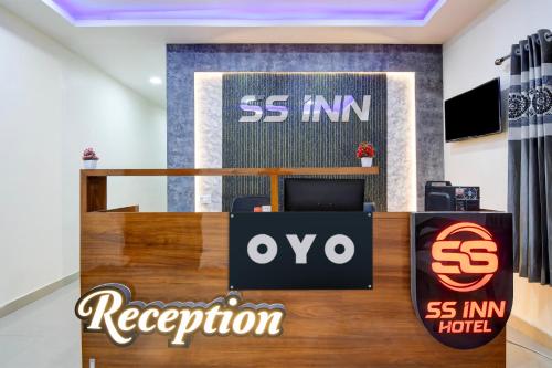 an office with a samsung sign and a reception desk at Hotel O SS INN in Bhubaneshwar