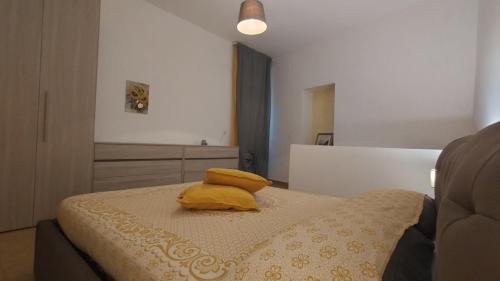 Ένα ή περισσότερα κρεβάτια σε δωμάτιο στο La Casa dei Nonni