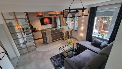 Χώρος καθιστικού στο Słoneczny Apartament