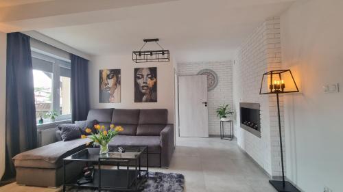 Χώρος καθιστικού στο Słoneczny Apartament