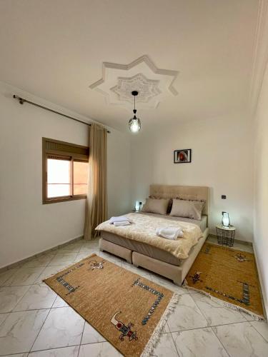 Riad Dar Fayçal - 6 Chambresにあるベッド