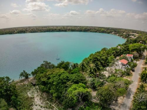 an aerial view of a large blue lake at Casa Del Lago Xul-ha - A una Cuadra de la Laguna de Bacalar in Xul-Ha