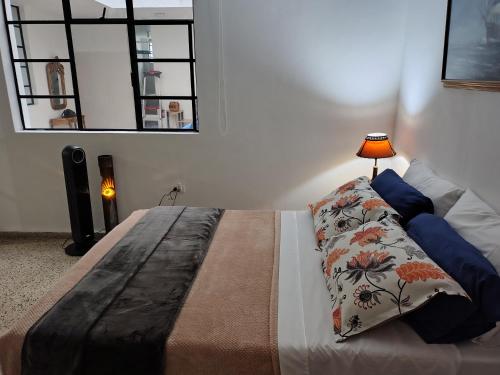 Katil atau katil-katil dalam bilik di Casa en Laureles Ideal para Familias