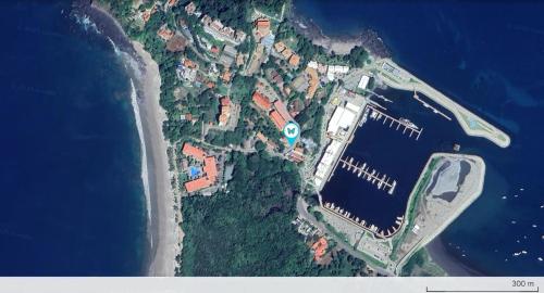 an overhead view of an island in the ocean at Playa Flamingo penthouse with pacific sunset views - Flamingo Rose Vista in Playa Flamingo