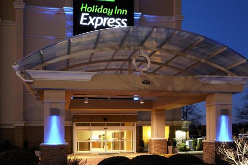 a lobby of a hotel with a large building at Holiday Inn Express Hotels- Hampton by IHG in Hampton