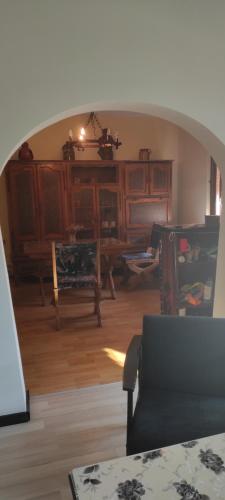 a living room with a table and a chair at Jagodina in Jagodina