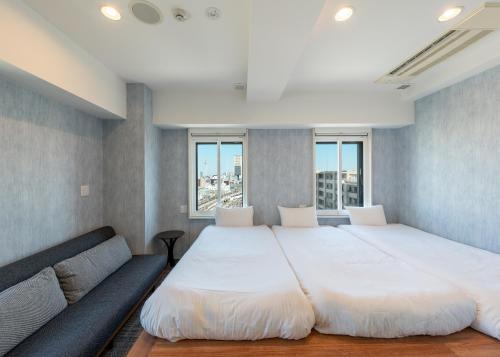Katil atau katil-katil dalam bilik di Tabist TOKYO CITY VIEW HOTEL