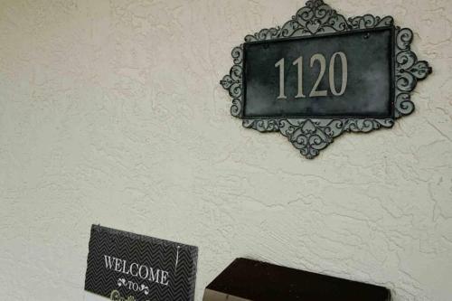 a sign on a wall with a welcome sign on it at Great Shape After Milton -gorgeous Pool! - Os in Venice