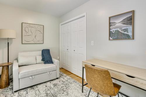 a living room with a desk and a chair at Boat, Fish and Unwind Waterfront Gem in Pocono Mtns in Lake Ariel