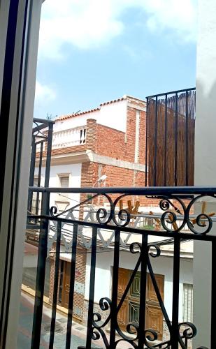 a view of a building from a balcony at Apartamento La Vista in Algarrobo