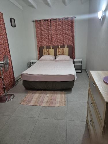 Llit o llits en una habitació de Villa PEGO