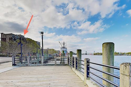 a view of a pier with a red arrow at Water Street Condos Unit 208 in Wilmington